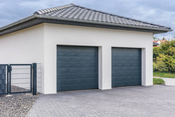 Modern double garage for cars building exterior seen from a public street gate stock pictures, royalty-free photos & images