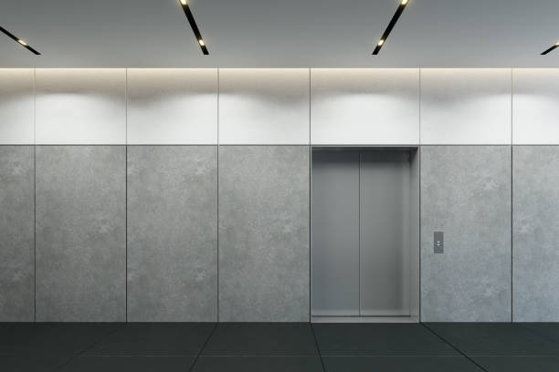 modern elevator with closed doors in office lobby, 3d rendering stock photo