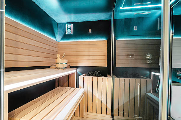 Modern Finnish sauna with neon lights. Beautiful interior home f stock photo