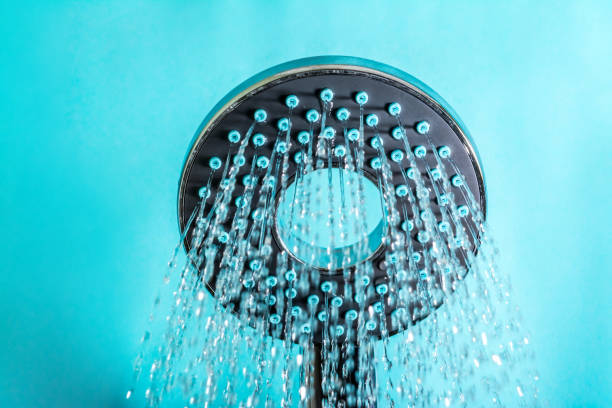 Modern hot shower with stream of water stock photo
