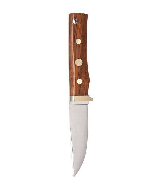 Modern hunting knife with silver blade and wooden handle. Steel arms. Isolate on a white background. stock photo