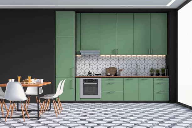 Modern kitchen and dining room on retro tiled floor stock photo