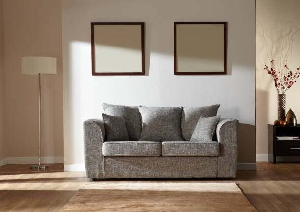 Modern living room with a grey sofa stock photo