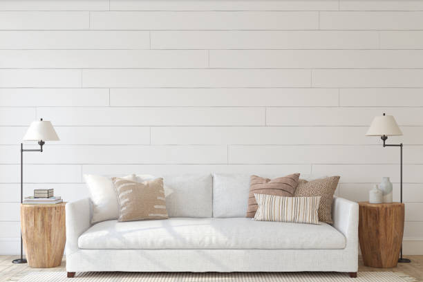 Modern living-room interior. Interior mockup. 3d render. Modern living-room interior. Interior mockup. The white couch near empty shiplap wall. 3d render. shiplap stock pictures, royalty-free photos & images