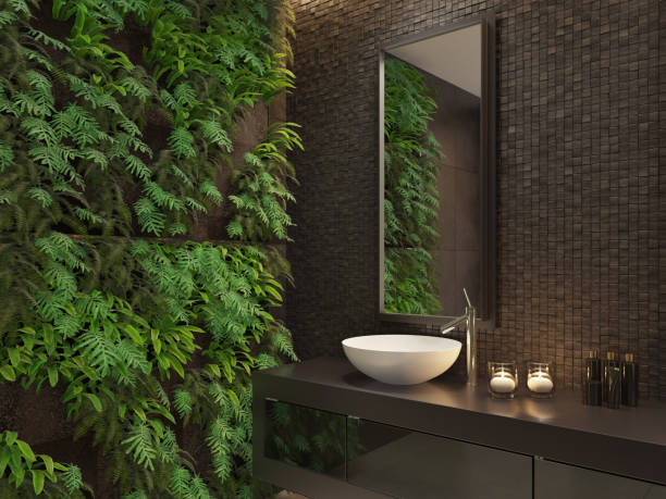Modern minimalist bathroom with green wall garden stock photo
