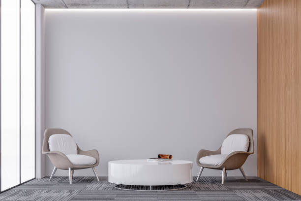 Modern office interior: a lounge corner with copy space stock photo
