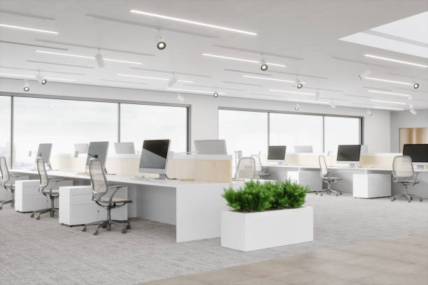 Modern Office Space Interior of an empty modern office space. clean desk stock pictures, royalty-free photos & images