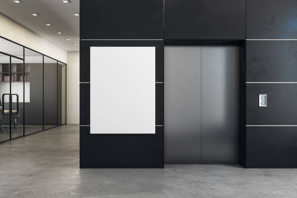 Modern office with elevator and banner stock photo