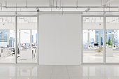 istock Modern Open Plan Office With White Blank Wall And Cityscape Background 1315107662