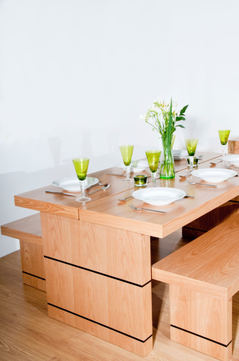 Modern Room Setting With Wooden Table Bench Seat And Cabinet Stock