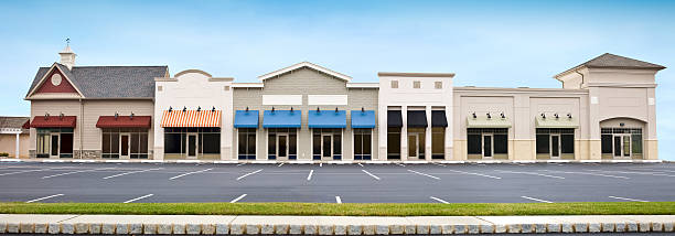 Modern Shopping Plaza Store Front Panoramic with Empty Parking Lot stock photo