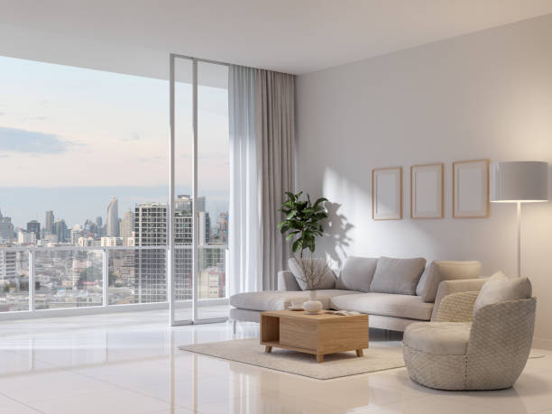 Modern style white living room with large open door overlooking city view 3d render stock photo