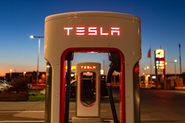 Modern Tesla supercharger at night near Stockholm. Sweden. stock photo