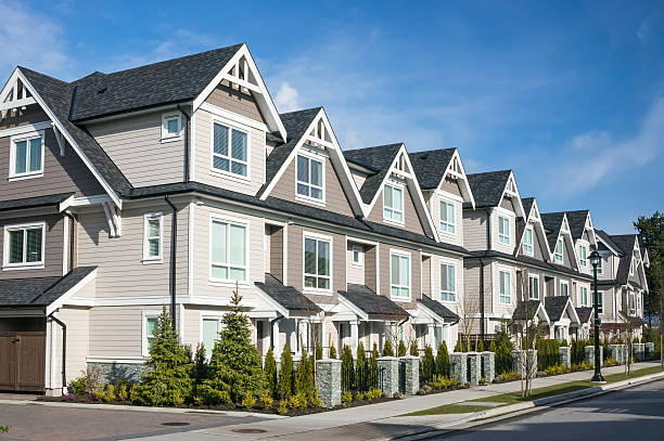 Modern townhouse complex Row of the new townhouses in Richmond, British Columbia. flat physical description stock pictures, royalty-free photos & images