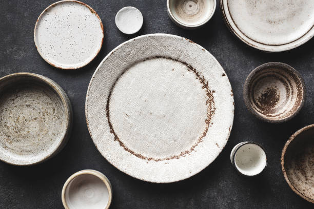 Modern Trendy Craft Ceramic Plates And Bowls stock photo