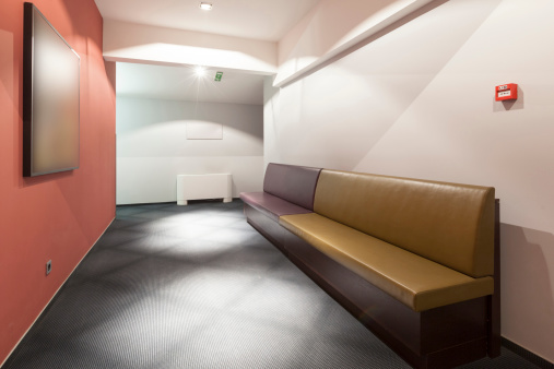 Modern Waiting Room With Elegant Leather Benches Stock Photo