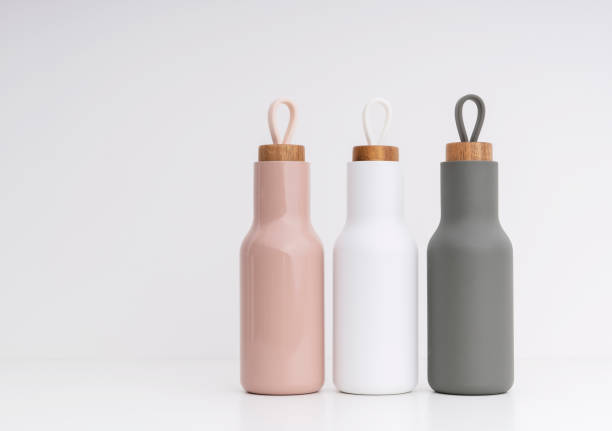 Modern water bottles on white background stock photo