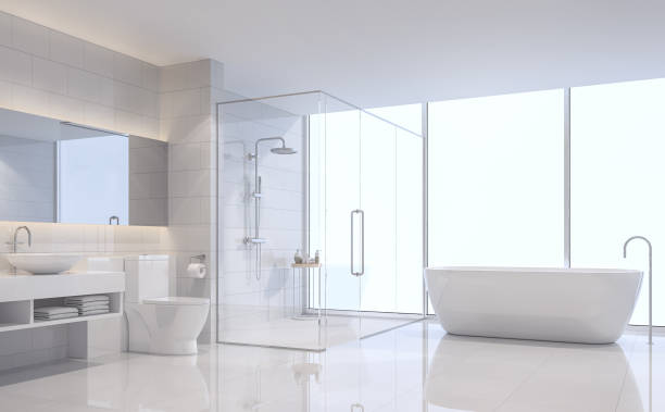 Modern white bathroom 3d rendering image Modern white bathroom 3d rendering image. There are white tile wall and floor.The room has large windows. Looking out to see the scenery outside. bathroom stock pictures, royalty-free photos & images