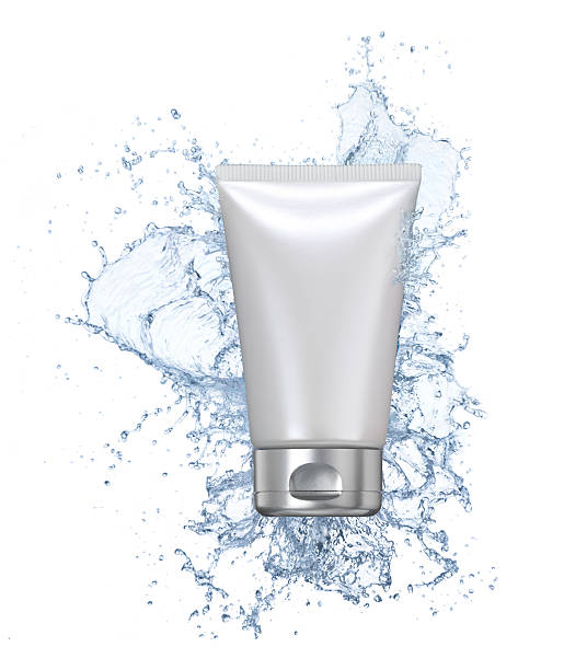 Moisturizing cream tube Blank tube with splashing water isolated on white background . cosmetic packaging stock pictures, royalty-free photos & images