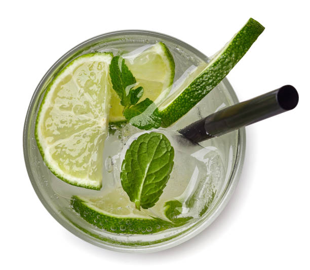 Mojito cocktail or soda drink Mojito cocktail or soda drink with lime and mint isolated on white background. From top view vodka soda stock pictures, royalty-free photos & images