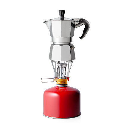 Moka coffee on portable camping stove with gas canister