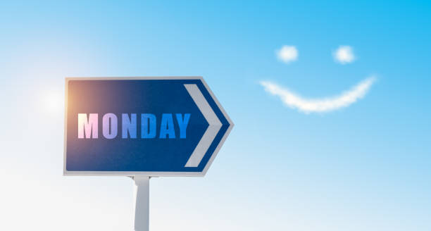 знак понедельника на фоне голубого неба со счастливыми облаками лица. - blue monday стоковые фото и изображения