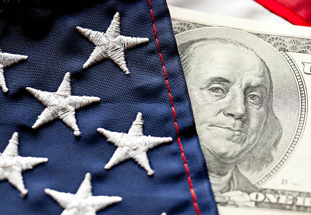 Money and Flag Close-up of Money and Flag. politics stock pictures, royalty-free photos & images