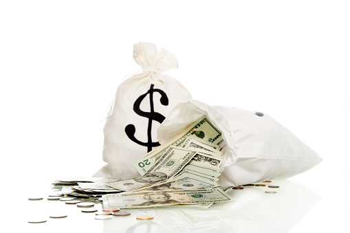 Money Bags With Dollars And Coins Stock Photo - Download Image Now - iStock