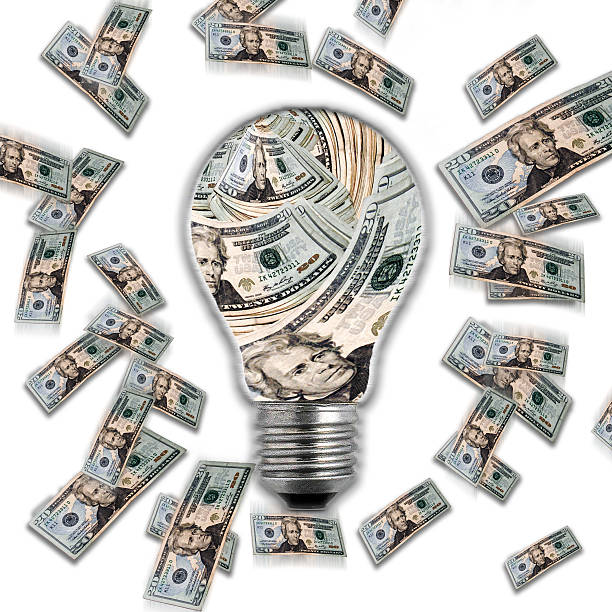 Money & Lightbulb stock photo