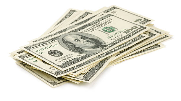 Money Stack of one hundred dollars bills isolated on white pile of money stock pictures, royalty-free photos & images