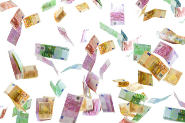 money rain of euro banknotes isolated on white background. - notas euros voar imagens e fotografias de stock
