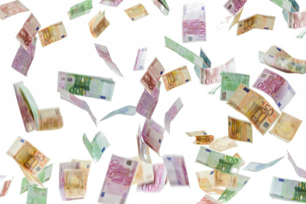 money rain of various euro banknotes isolated on white background - notas euros voar imagens e fotografias de stock