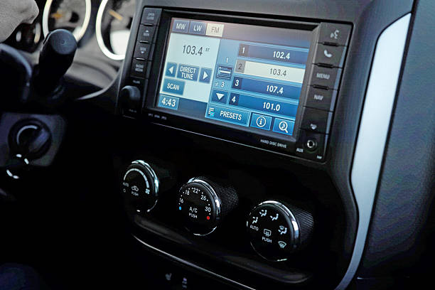 monitor on the dashboard of the car - autoradio stockfoto's en -beelden