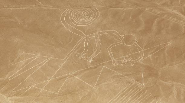 Monkey geoglyph, Nazca mysterious lines and geoglyphs stock photo