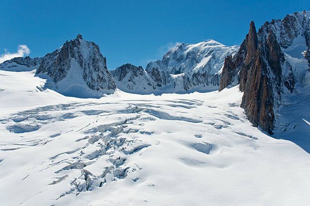 Mont Blanc Massif and Glacier Crevasse stock photo