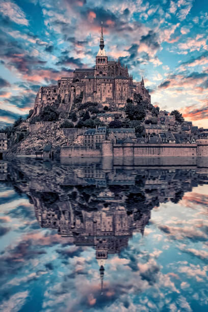 Mont St Michel in the daytime Mont Saint Michel, a UNESCO world heritage site in Normandy, France manche stock pictures, royalty-free photos & images
