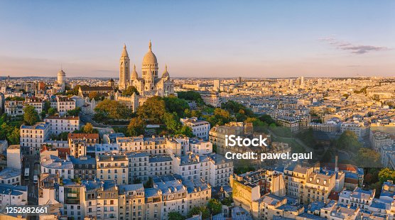 istock Montmartre hill with Basilique du Sacre-Coeur in Paris at sunset, aerial view 1252682661