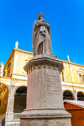 View at monument of poet Dante Alighieri in the Piazza dei Signori in Verona, Italy