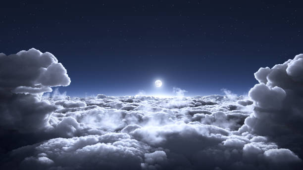 Moon above the clouds stock photo