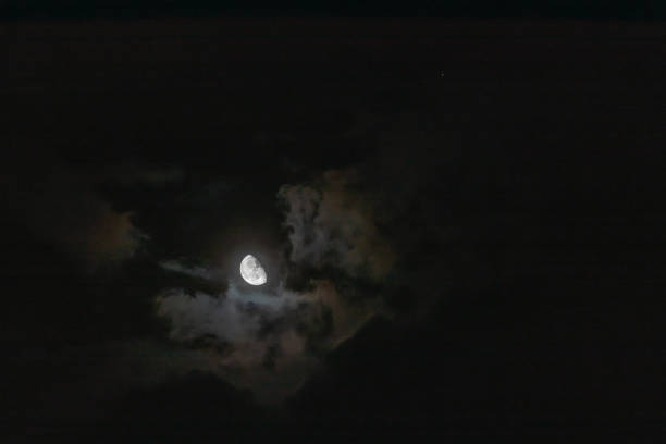 Moon and Mars in night sky stock photo