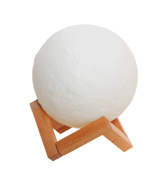 moon lamp on a wooden stand, on a white background in isolation stock photo
