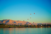istock Morning Hot Air Balloons With Nile River And East Bank In Luxor In Egypt 1303782500