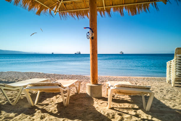 Morning on sandy beach at the Red Sea near Eilat stock photo