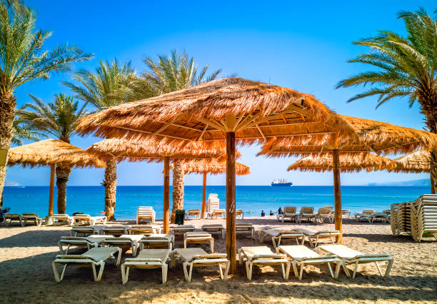 Morning on sandy beach in Eilat stock photo
