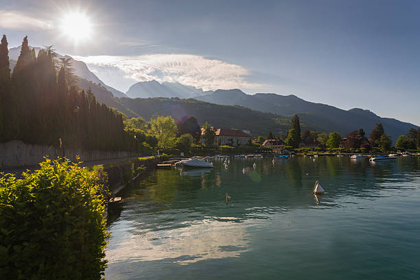 Morning sun over harbour of Talloires at Lake Annecy stock photo
