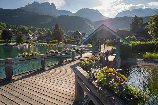 Morning sun over village of Talloires at Lake Annecy stock photo