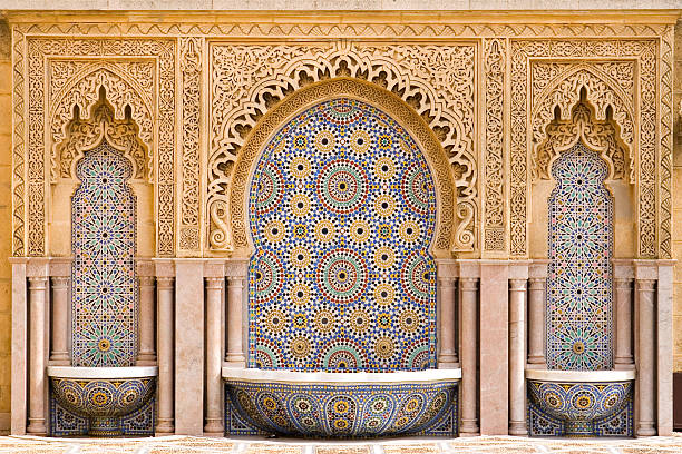 Moroccan tiled fountain Typical moroccan tiled fountain in the city of Rabat, near the Hassan Tower and Mohamed V Mausoleum. The Mausoleum is a true master-work of Moroccan art. The best craftsmen of morocco took part in the work. marrakesh stock pictures, royalty-free photos & images