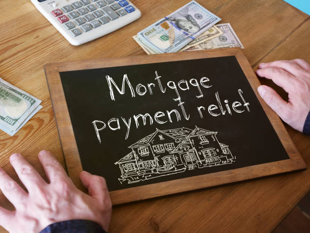 Mortgage payment relief is shown on the photo using the text Mortgage payment relief is shown on a photo using the text relief carving stock pictures, royalty-free photos & images