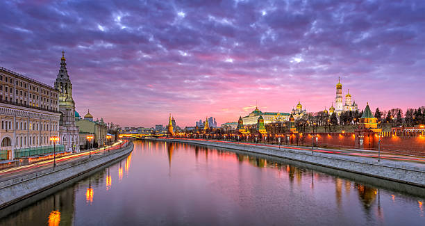 Moscow Kremlin and the Sofia embankment with a red sunset stock photo