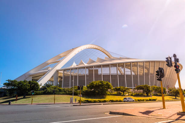 Moses Mabhida Stadium in Durban Moses Mabhida Stadium seen from below at sunrise from the city centre. This stadium was built towards the FIFA World Cup in 2010, with a capacity of 54000 people. durban stock pictures, royalty-free photos & images
